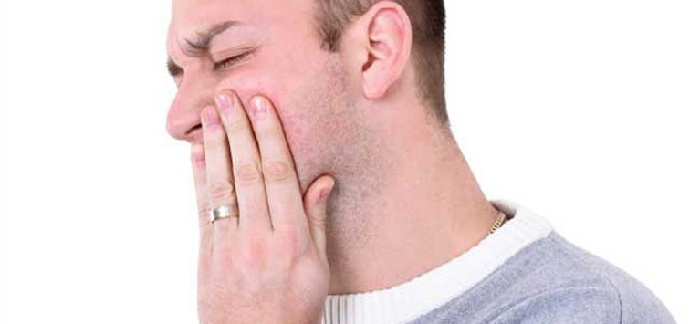 Man suffers from Tooth Pain
